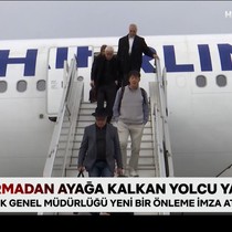 Uçak durmadan ayağa kalkan yolcu yandı
