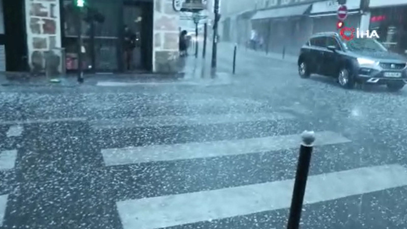 Paris’te 25 derece sıcaklıkta dolu yağdı